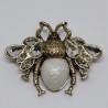 Antique gold bug brooch