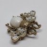 Antique gold bug brooch